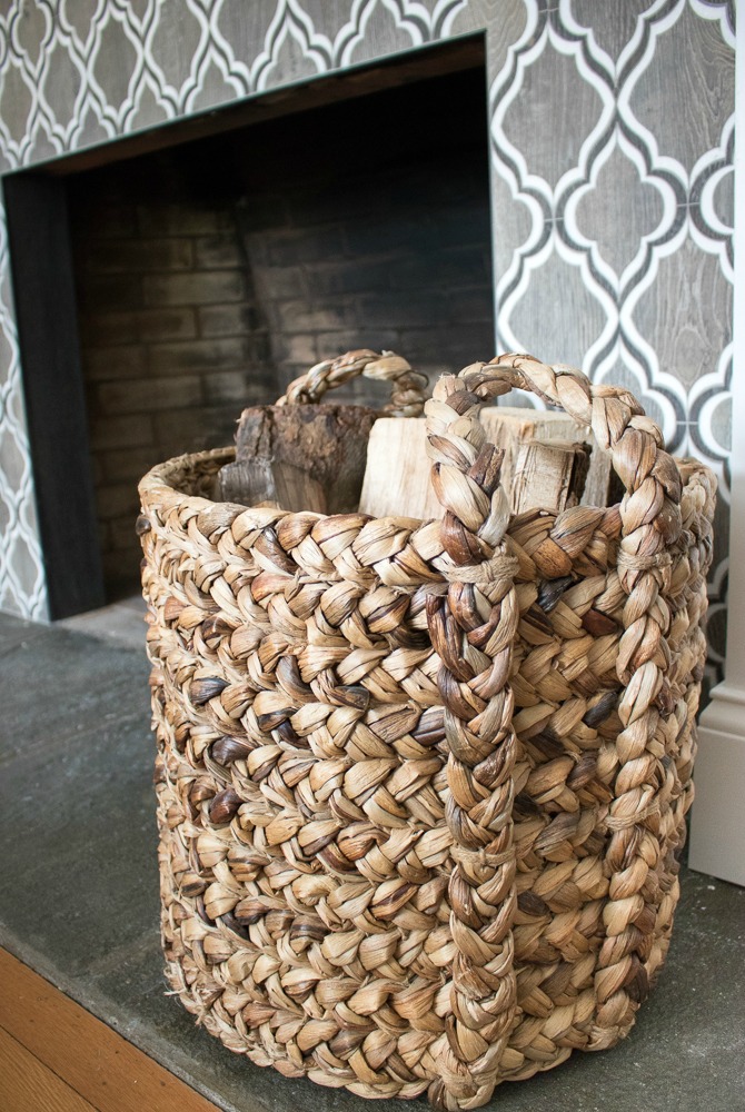 Use a Basket to Store Logs by a Fireplace