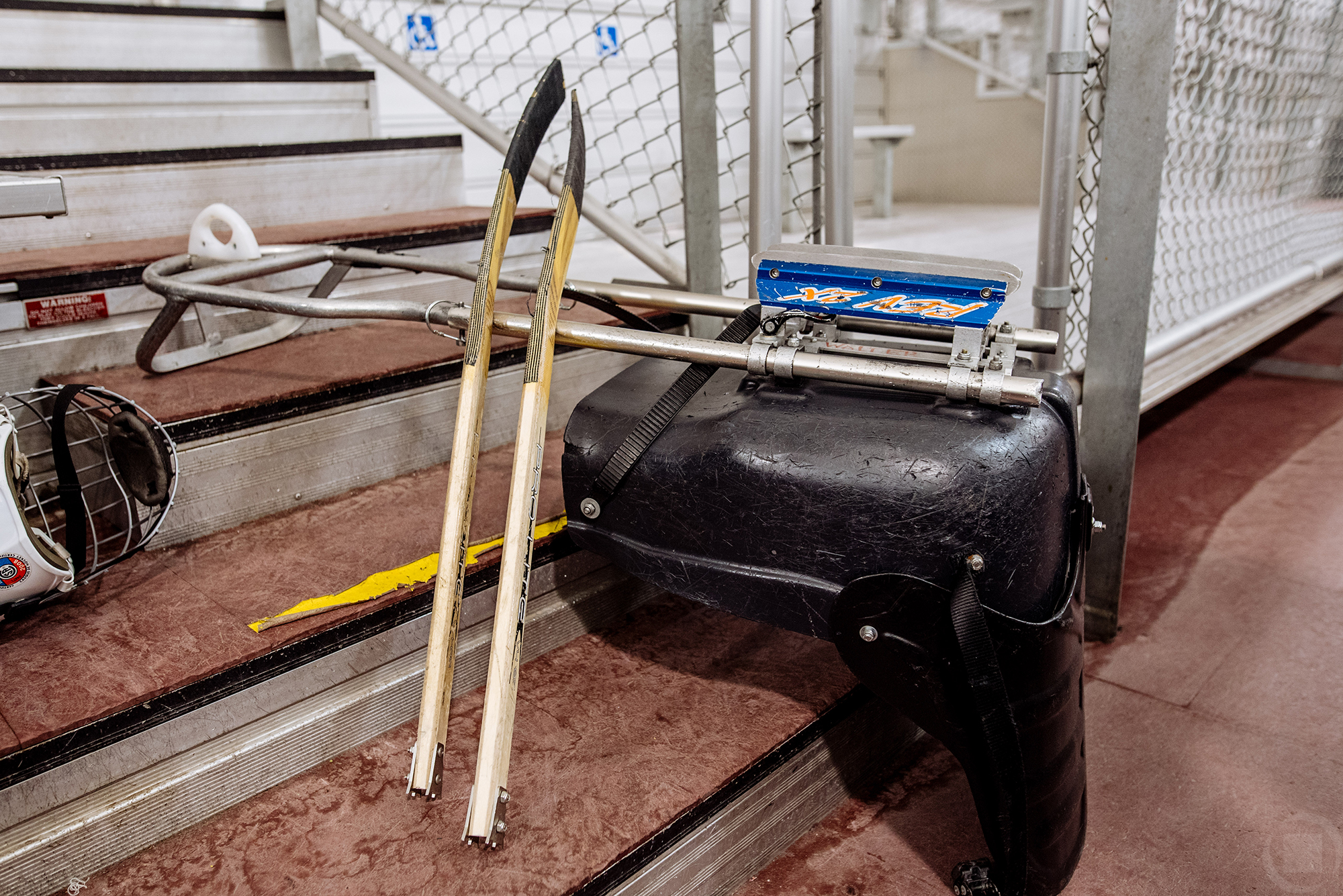 sled hockey equipment sticks bleacher