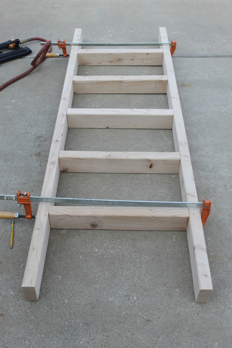how to make a ladder - clamp and allow wood glue to dry