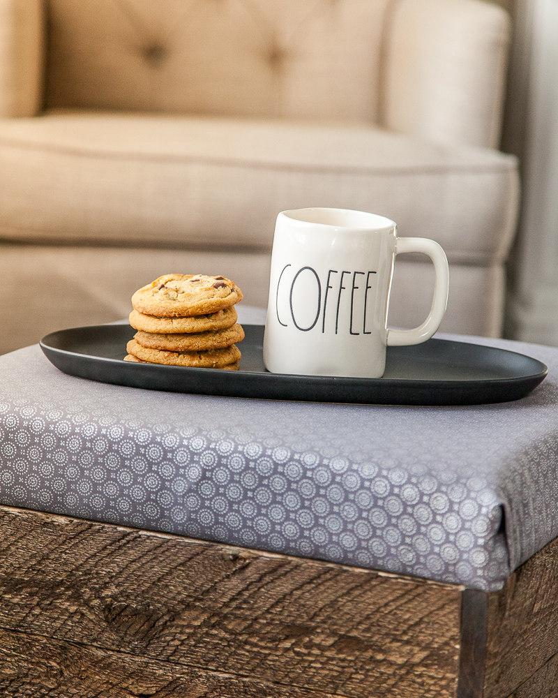 farmhouse diy storage ottoman made of wood with coffee and cookies on top