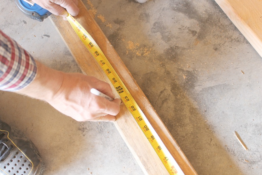 DIY Garage Storage Shelves - Measure the Center of the Board