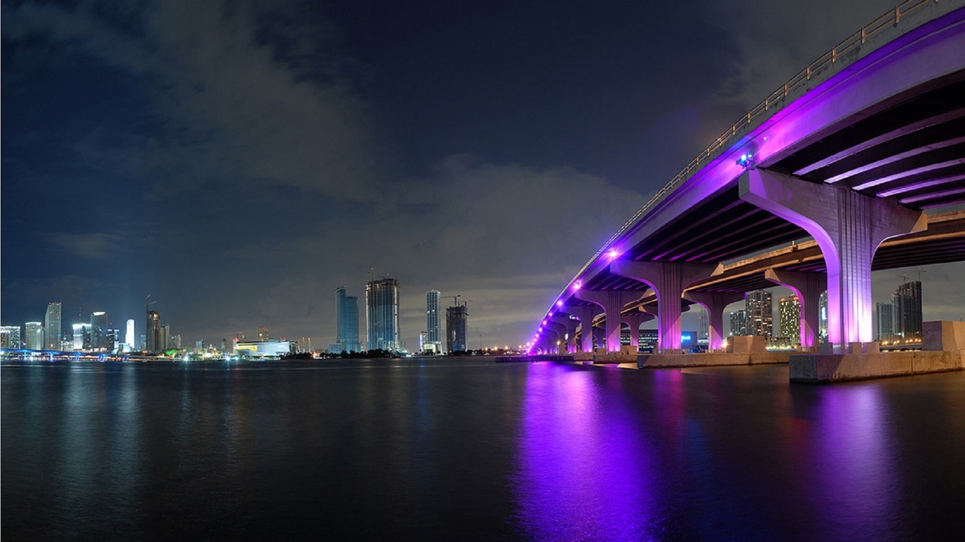 Miami bridge night purple lights
