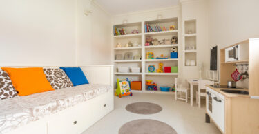how to organize a kid's room - picture of spacious child room in new simple style