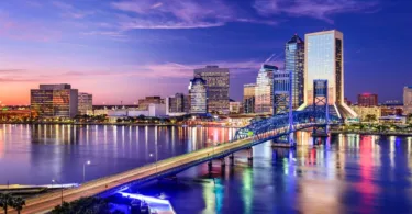 Nighttime skyline view of Jacksonville, FL